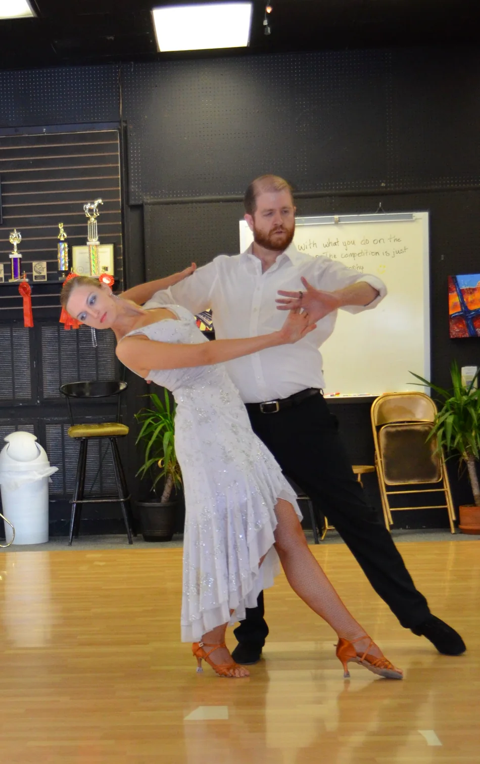 Eric and Bria Bird practicing a ballroom dance pose